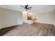 Bright living room features elegant gray flooring, connecting seamlessly to the kitchen and dining area at 2900 Sunridge Heights Pkwy # 518, Henderson, NV 89052