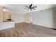Spacious living room boasts modern gray floors and bar top kitchen counter, perfect for entertaining and relaxation at 2900 Sunridge Heights Pkwy # 518, Henderson, NV 89052