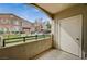 A small patio overlooks community landscaping and a parking area at 2900 Sunridge Heights Pkwy # 518, Henderson, NV 89052
