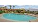 Community pool with fountains and seating area at 2900 Sunridge Heights Pkwy # 518, Henderson, NV 89052
