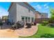 A backyard with a stone patio and an artificial turf area at 2935 Saltillo Ln, Las Vegas, NV 89121