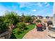 Backyard featuring a stone patio and lush landscaping at 2935 Saltillo Ln, Las Vegas, NV 89121