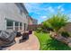 This backyard has a stone patio and artificial grass at 2935 Saltillo Ln, Las Vegas, NV 89121