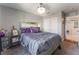 Neutral bedroom with a comfortable bed, soft carpet flooring, and a closet at 2935 Saltillo Ln, Las Vegas, NV 89121