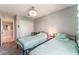 This is a bedroom featuring two beds, gray walls, and a closet at 2935 Saltillo Ln, Las Vegas, NV 89121