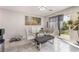 Comfortable dining area features modern table with seating and sliding glass doors to the backyard at 2935 Saltillo Ln, Las Vegas, NV 89121