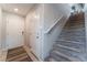 Welcoming entryway featuring a staircase with carpet steps and a light-filled foyer at 2935 Saltillo Ln, Las Vegas, NV 89121