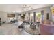 Bright living room with stylish furniture, tile floors, and plenty of natural light at 2935 Saltillo Ln, Las Vegas, NV 89121