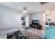 Spacious upstairs bonus living room features a sleek design, ample seating, and versatile space at 2935 Saltillo Ln, Las Vegas, NV 89121