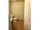 Bathroom featuring a standard toilet, tile flooring and door to the space at 2981 Country Manor Ln # 118, Las Vegas, NV 89115
