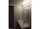 Bathroom with a single sink vanity, and an open doorway at 2981 Country Manor Ln # 118, Las Vegas, NV 89115