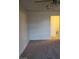 This bedroom features neutral carpet, ceiling fan, and an ensuite bathroom for added convenience at 2981 Country Manor Ln # 118, Las Vegas, NV 89115