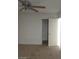 Bedroom has carpet, ceiling fan, and a white door at 2981 Country Manor Ln # 118, Las Vegas, NV 89115