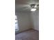 Bedroom featuring carpet, a window, ceiling fan, and neutral walls at 2981 Country Manor Ln # 118, Las Vegas, NV 89115