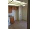 Neat kitchen design with tile floors and essential amenities at 2981 Country Manor Ln # 118, Las Vegas, NV 89115