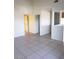 Open living area showcases tile flooring and bright, neutral walls at 2981 Country Manor Ln # 118, Las Vegas, NV 89115