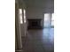 Spacious living room with a fireplace and sliding door to patio at 2981 Country Manor Ln # 118, Las Vegas, NV 89115