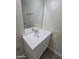 Bathroom featuring a modern single vanity with sink, bright lighting, and large mirror at 304 Orland St # 39, Las Vegas, NV 89107