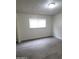 Well-lit bedroom featuring a large window and modern flooring at 304 Orland St # 39, Las Vegas, NV 89107