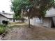 Two story apartment building with central courtyard with a large shade tree at 304 Orland St # 39, Las Vegas, NV 89107