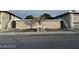 Two-story apartment complex with dual exterior staircases and mature tree at 304 Orland St # 39, Las Vegas, NV 89107