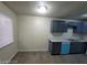 A kitchen with hardwood floors and natural light from a window at 304 Orland St # 39, Las Vegas, NV 89107