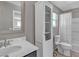 Well-lit bathroom featuring a vanity, toilet, and shower-tub combination with modern fixtures at 3132 Cartanda Ave, Henderson, NV 89044