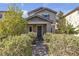 Charming home with well-manicured landscaping and a welcoming front porch at 3132 Cartanda Ave, Henderson, NV 89044