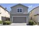 A two-story home featuring a two car garage and beautiful facade, offering suburban comfort and curb appeal at 3132 Cartanda Ave, Henderson, NV 89044