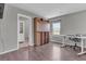 Functional home office space with built-in desk, Murphy bed, and ample light at 3132 Cartanda Ave, Henderson, NV 89044