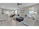 Spacious living area with ample seating, natural light, and seamless flow to the kitchen at 3132 Cartanda Ave, Henderson, NV 89044