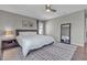 Inviting main bedroom with neutral walls, hardwood floors, and a large comfortable bed at 3132 Cartanda Ave, Henderson, NV 89044