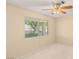Bright bedroom with a ceiling fan and large window allowing natural light at 3250 Duneville St, Las Vegas, NV 89146