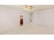 Spacious bedroom with large closets, neutral carpet, and an en suite bathroom at 3250 Duneville St, Las Vegas, NV 89146