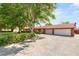 Spacious home with a large driveway and a two-car garage at 3250 Duneville St, Las Vegas, NV 89146