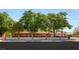 Charming single-story home with mature trees and a brick perimeter wall at 3250 Duneville St, Las Vegas, NV 89146