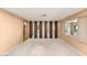 Open living area with a large window and decorative wood columns at 3250 Duneville St, Las Vegas, NV 89146