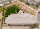 The backyard features artificial turf, a trampoline, and plenty of space for entertaining with desert landscaping at 438 Wind Poppy St, Las Vegas, NV 89138