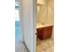Bathroom features a built-in vanity with wood cabinets at 438 Wind Poppy St, Las Vegas, NV 89138