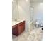 Bathroom with wood vanity and tile floors at 438 Wind Poppy St, Las Vegas, NV 89138