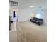 Carpeted bonus room with couch and window at 438 Wind Poppy St, Las Vegas, NV 89138