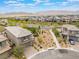 Aerial view of a single-Gathering home, featuring a well-manicured lawn and a neighborhood with mountain views at 438 Wind Poppy St, Las Vegas, NV 89138