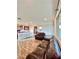 Bright, open-concept living area flows seamlessly into the kitchen, and features hardwood floors and recessed lighting at 438 Wind Poppy St, Las Vegas, NV 89138