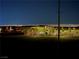 Neighborhood at night, city lights in distant background at 438 Wind Poppy St, Las Vegas, NV 89138