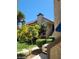 Inviting two-story condo with well-maintained landscaping and lush green lawn at 4720 Obannon Dr # D, Las Vegas, NV 89102