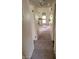 Hallway view leading to a room with natural light streaming through the window at 4720 Obannon Dr # D, Las Vegas, NV 89102