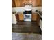 Kitchen area with stainless steel oven and wood-look vinyl flooring at 4720 Obannon Dr # D, Las Vegas, NV 89102