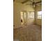 Living room features windows and a doorway to another room with a ceiling fan at 4720 Obannon Dr # D, Las Vegas, NV 89102