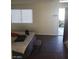 Spacious bedroom with wood flooring, ample natural light, and access to the outdoors at 4770 Topaz St # 79, Las Vegas, NV 89121