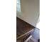Landing space with hardwood floors, a window, and access to the rooms at 4770 Topaz St # 79, Las Vegas, NV 89121